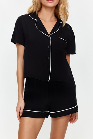 Camisa e calções Preto