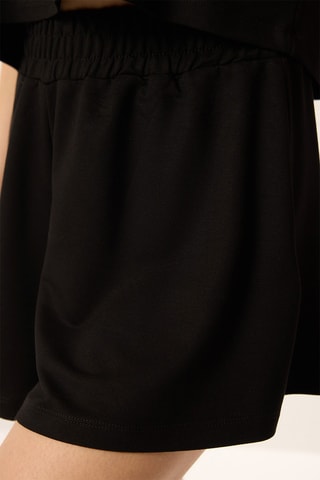 T-shirt e calções - Preto