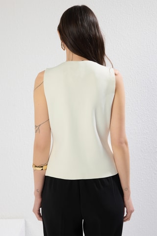 Colete de fato - Cru