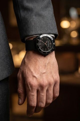 Reloj de cuarzo de acero - Negro