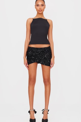 Top e minigonna - Nero