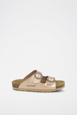 Mules em couro 
Dourado