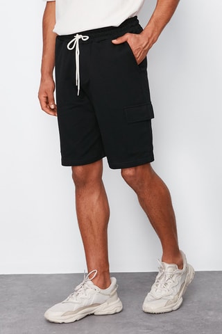 2 bermudas - 
Noir et kaki