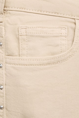 Jean taille basse à clous - Sable