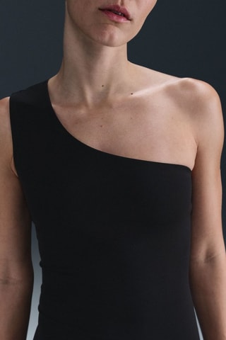 Top asymétrique Nike Zenvy - Noir
