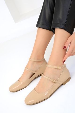 Bebés envernizados - Bege