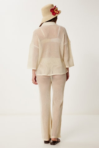 Casaco de malha e calças Nude