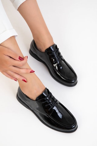 Derbies envernizados Preto