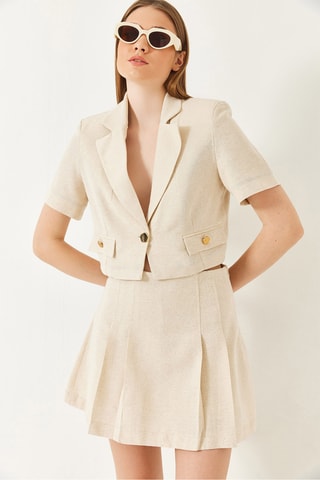 Casaco curto e minissaia plissada de cintura subida - Bege