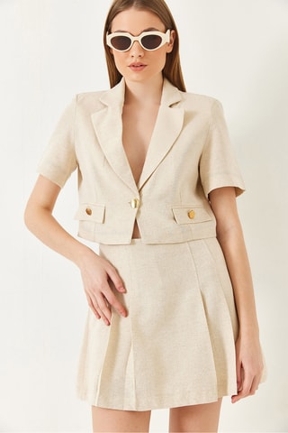 Casaco curto e minissaia plissada de cintura subida - Bege