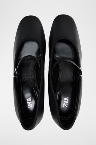 Babies de salto em couro- Preto