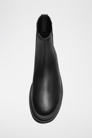 Botins Chelsea de couro- Preto