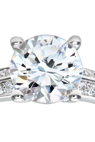 Bague - Or blanc et zircons