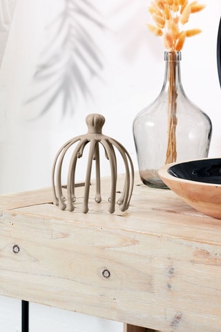 Masajeador para la cabeza.