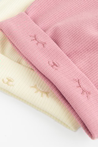 2 mutsen met oortjes - Roze en Wit