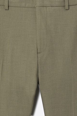 Pantalón slim fit - Verde almendra