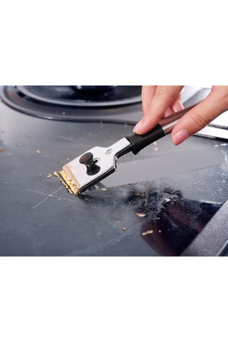 Racloir pour plaque de cuisson en acier inoxydable
