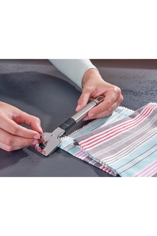 Racloir pour plaque de cuisson en acier inoxydable