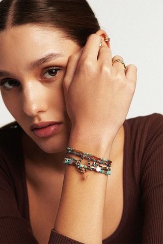 Bracelet doré à l'or fin jaune - Hématites, corail, turquoises et grenats