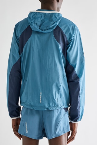 Veste de running à capuche - Bleu clair