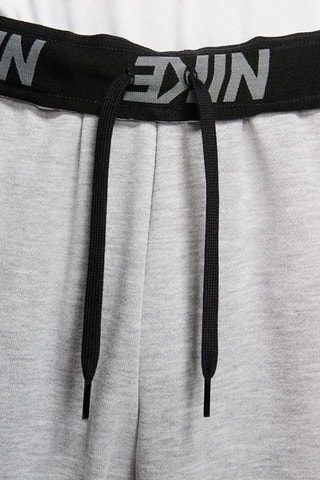 Pantaloni tapered in pile da training - Grigio chiaro melange - Nike