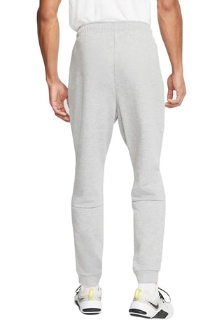 Pantaloni tapered in pile da training - Grigio chiaro melange - Nike