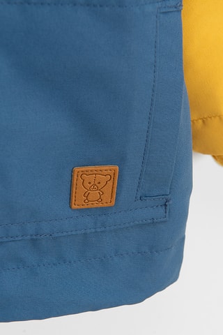 Imperméable à capuche - Bleu pétrole et jaune