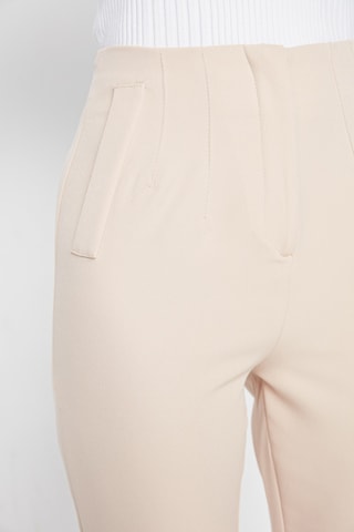 Pantalón slim fit 7/8 de tiro alto - Beige