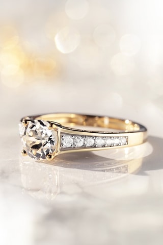Anillo Kriva - Oro amarillo, diamantes y topacio