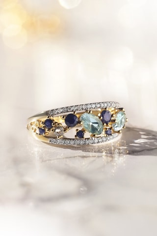 Anillo Dahra - Oro amarillo, diamantes, topacios y zafiros