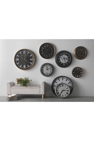 Reloj mural - Dorado y negro
