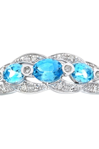 Anillo - Oro blanco, diamantes y topacios