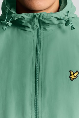 Cortavientos con capucha - Verde