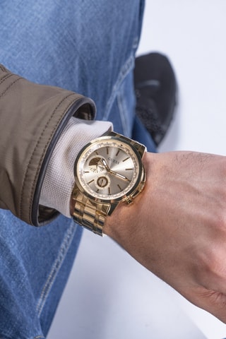 Reloj de cuarzo de acero - Dorado