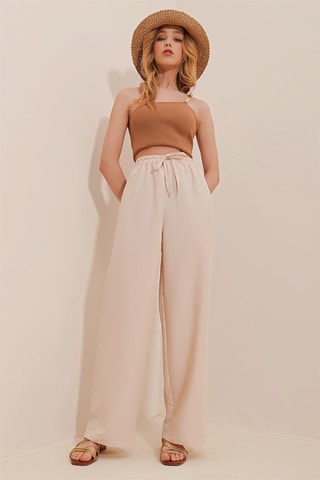 Pantaloni - 
Beige