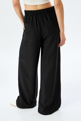 Pantaloni wide legs a vita alta - Nero