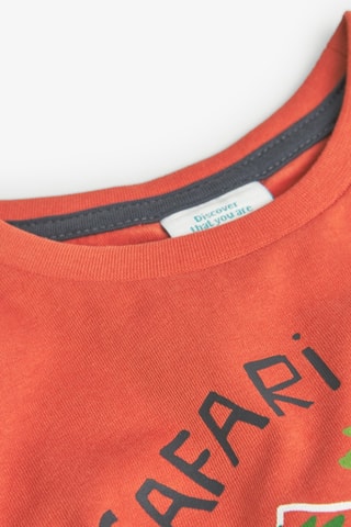 T-shirt - Oranje en multicolor