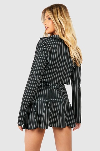 Veste courte et minijupe plissée taille haute - Noir et blanc