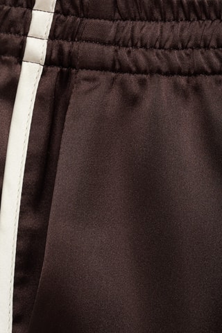 Short individuel en lin enduit avec overlock contrasté - Prune