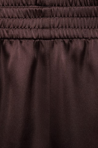 Short individuel en lin enduit avec overlock contrasté - Prune