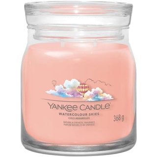 Vela perfumada tarro mediano - Cielo de colores