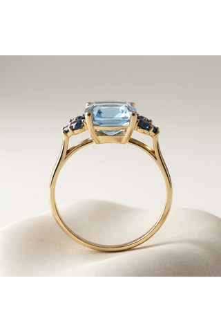 Anillo - Oro amarillo y topacios