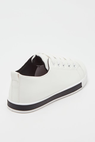 Sneakers 
Wit en Zwart
