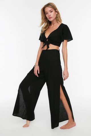Pantaloni wide legs a vita alta