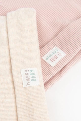 2 bonnets à oreilles - Ecru et rose poudré