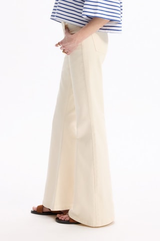 Pantalón flare de tiro alto - Crudo
