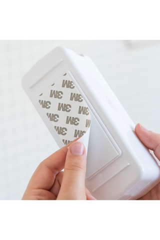 Dispenser dentifricio con portaspazzolini da denti