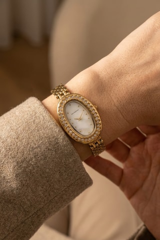Reloj de cuarzo de acero - Dorado