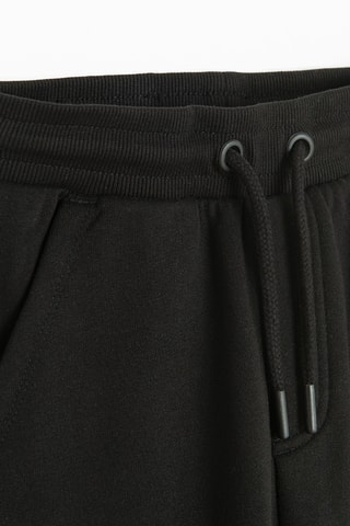 Calças de treino - Branco e preto