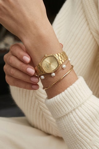 Reloj de cuarzo de acero - Dorado